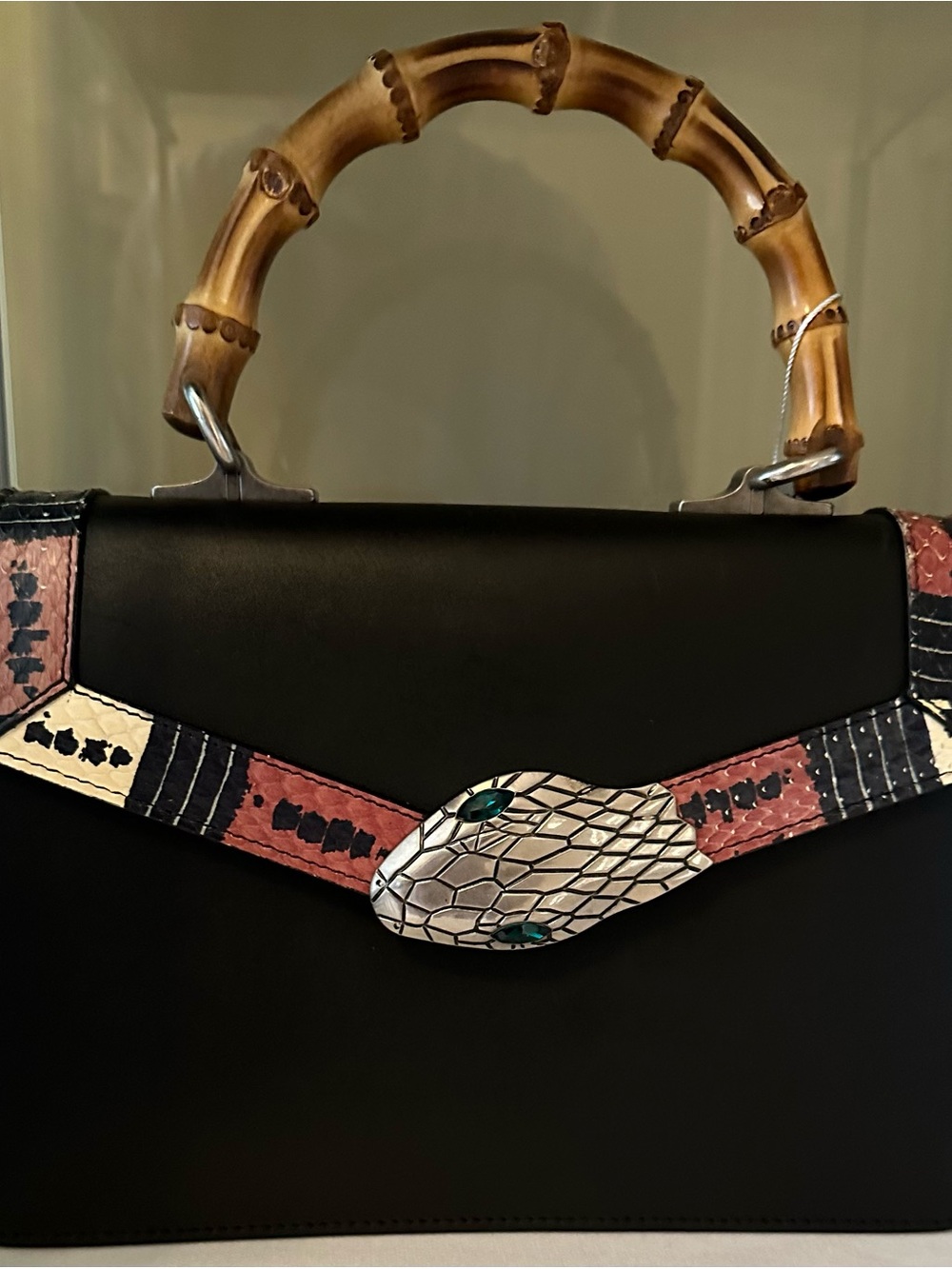 Pre-Owned Gucci Black Bag with Bamboo-Style Handle and Snake Accent